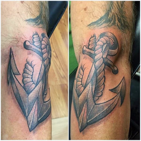 Anchor tattoo with rope detailing on an arm