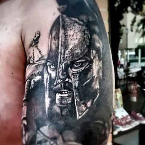 Ancient Solider Men's Spartan Tattoo Designs On Arm