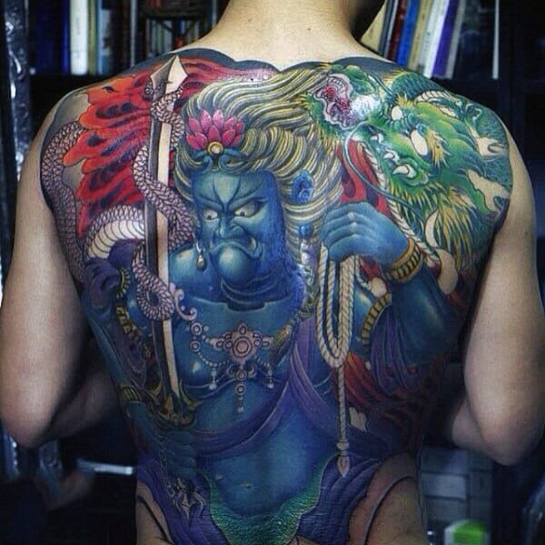 Ancient Tribal Chief With Blue Body And Arrows Tattoo Guys Full Back