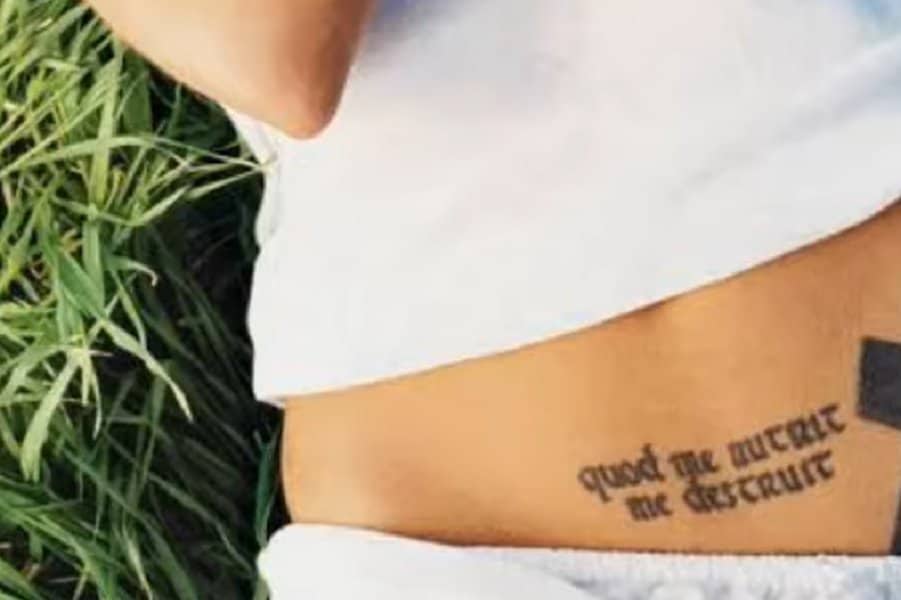 “Quod Me Nutrit Me Destruit" Tattoo