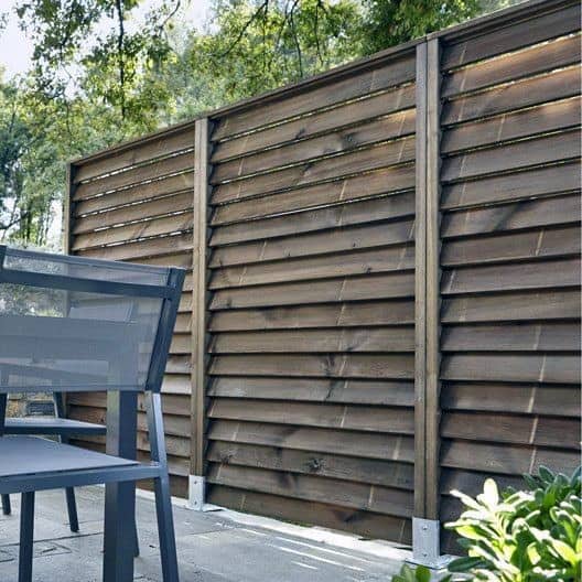 angled wood board privacy fence ideas