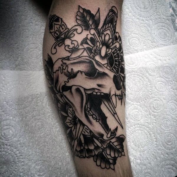 Animal Skull With Dagger Mens Traditional Leg Tattoos