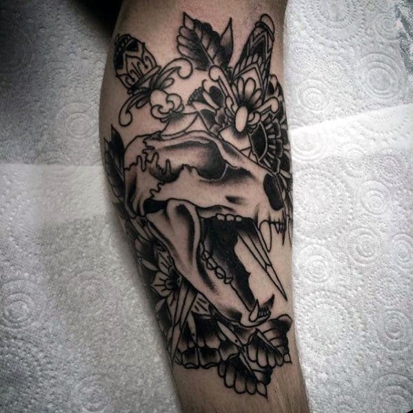 animal-skull-with-dagger-traditional-leg-shaded-mens-tattoos