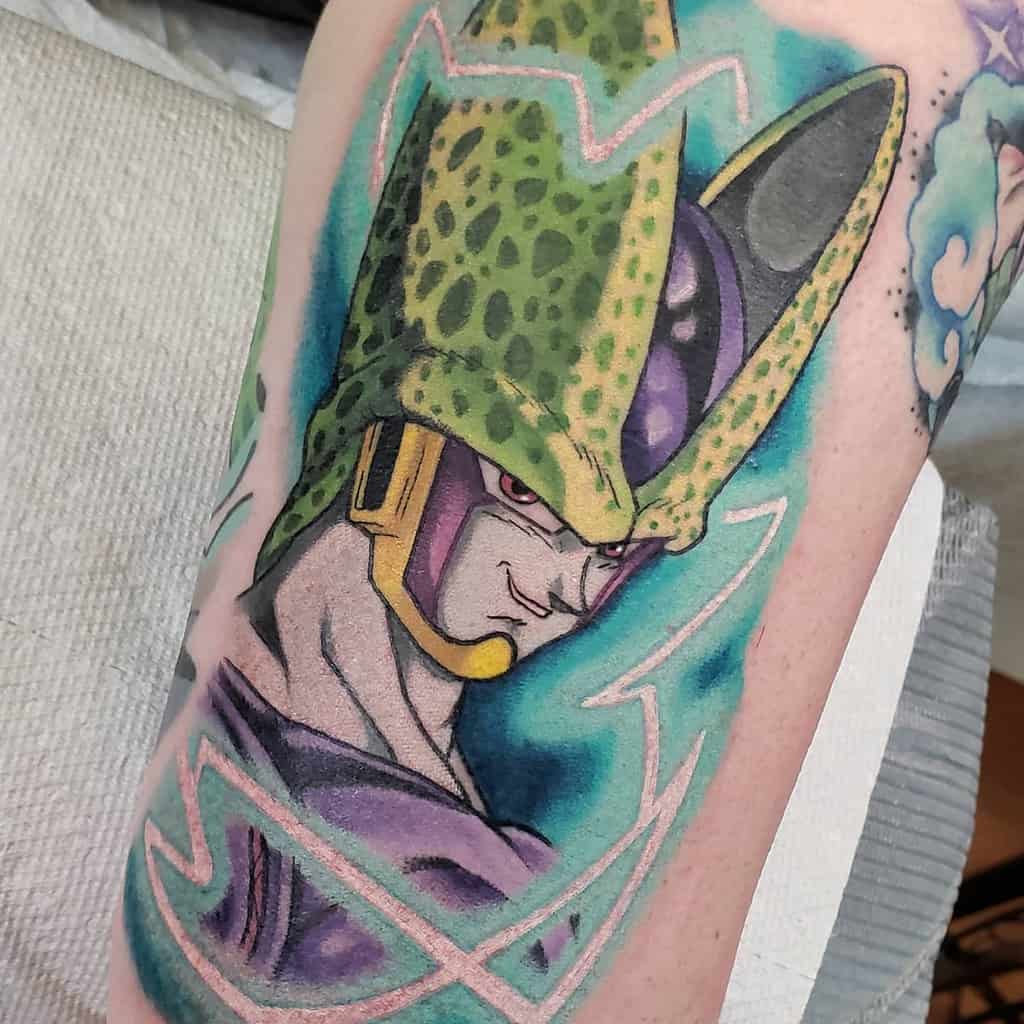 Vibrant tattoo of Cell from Dragon Ball, featuring bold shading, electric aura effects, and a striking teal background.