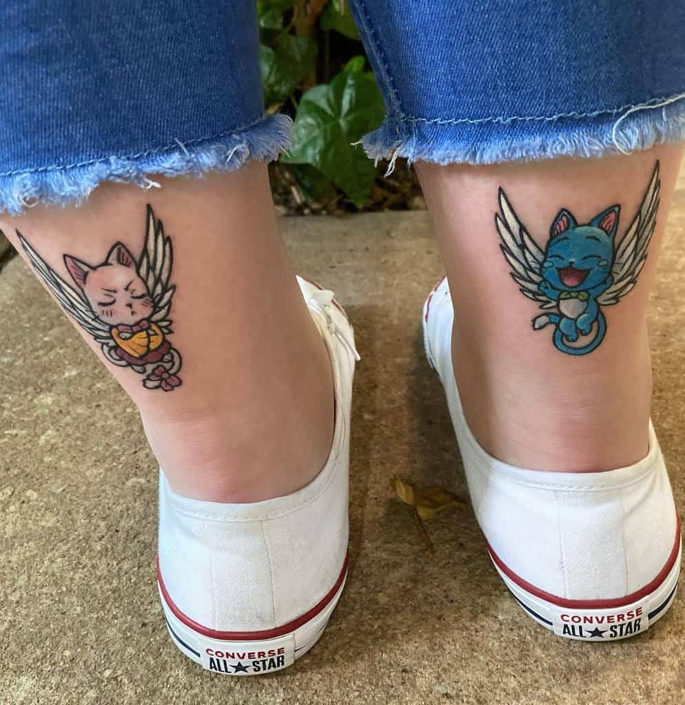 Colorful ankle tattoos of Happy and Carla from Fairy Tail, featuring detailed wings and expressive faces, adding a playful and vibrant touch.