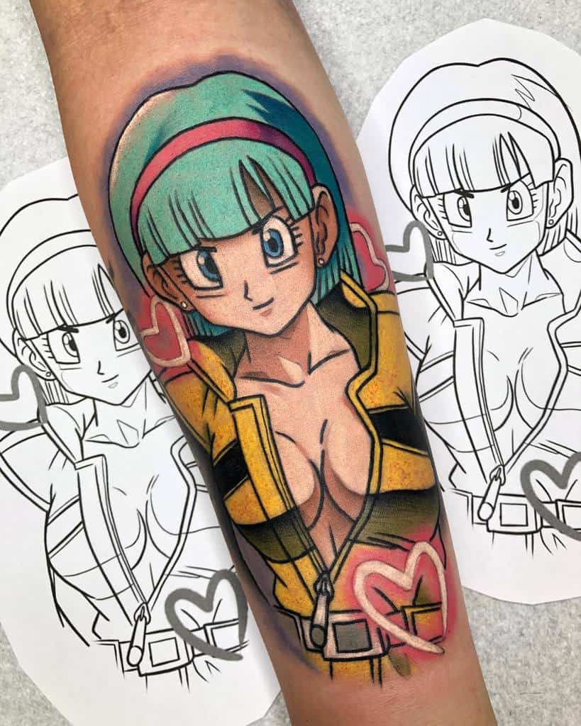 A vibrant tattoo of Bulma from *Dragon Ball*, featuring her iconic outfit with a bold heart-shaped accent, showcasing colorful details and a strong expression.