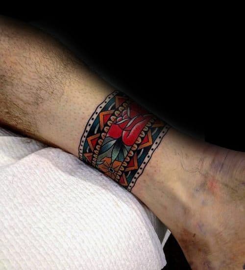 Ankle Band Old School Traditional Flower Tattoo Design On Man