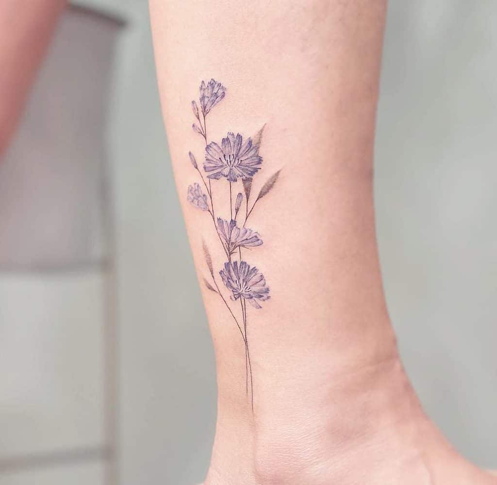 Ankle wildflower tattoo