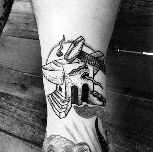 Black and white anvil tattoo with dot shading, featuring a cracked base, rising smoke, and a hammer resting on top.