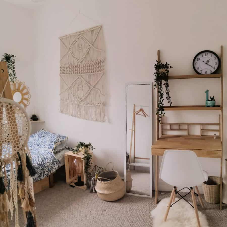 Minimalist boho bedroom with macramé wall art, natural wood furniture, and cozy earthy tones.