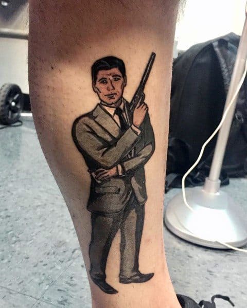 Black and gray tattoo of Sterling Archer in a suit, holding a gun, exuding his signature secret agent confidence and style.