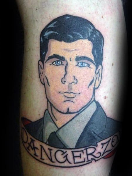 Clean-lined tattoo of Sterling Archer in a suit with a confident stare, featuring a 'Danger Zone' banner in bold lettering.