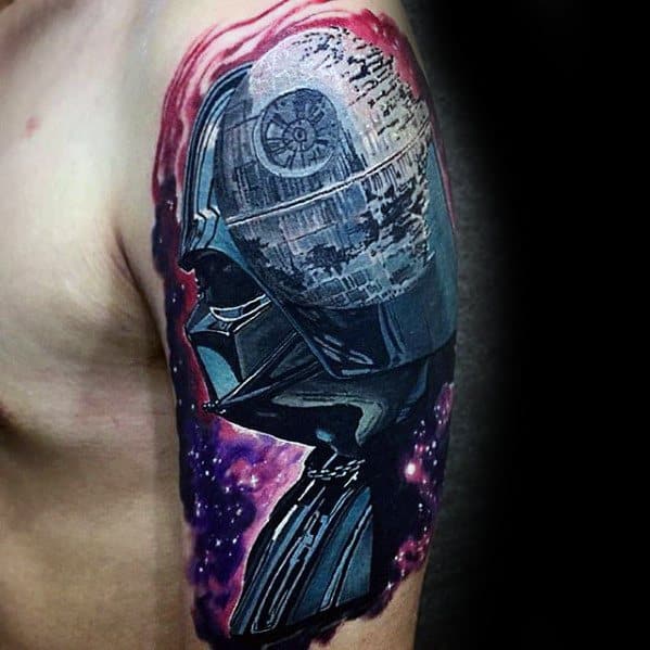 Tattoo of a sci-fi helmet and Death Star on an arm