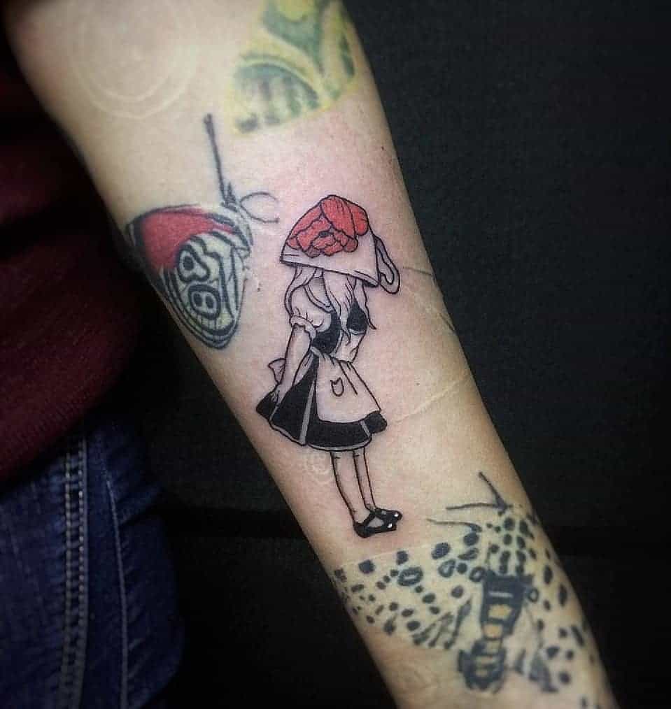 A minimalist tattoo of Alice from Alice in Wonderland, a large teacup with red flowers as her hat  , depicted in black and white ink