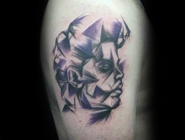Abstract geometric tattoo of Prince in shades of purple, capturing his iconic profile with artistic flair.