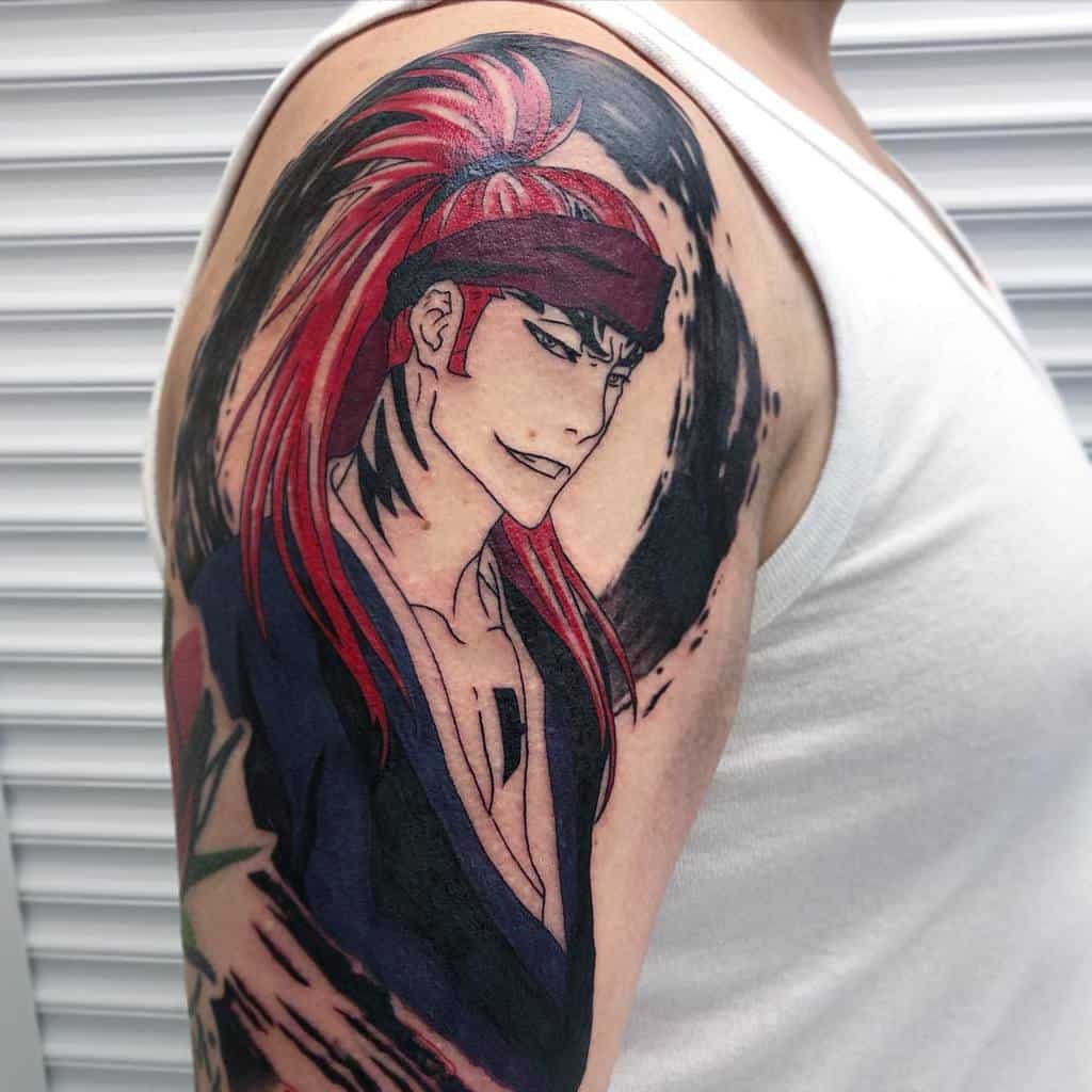 Vibrant tattoo of Renji Abarai from Bleach, featuring his red hair, headband, and black Shihakusho, surrounded by a bold ink swirl 