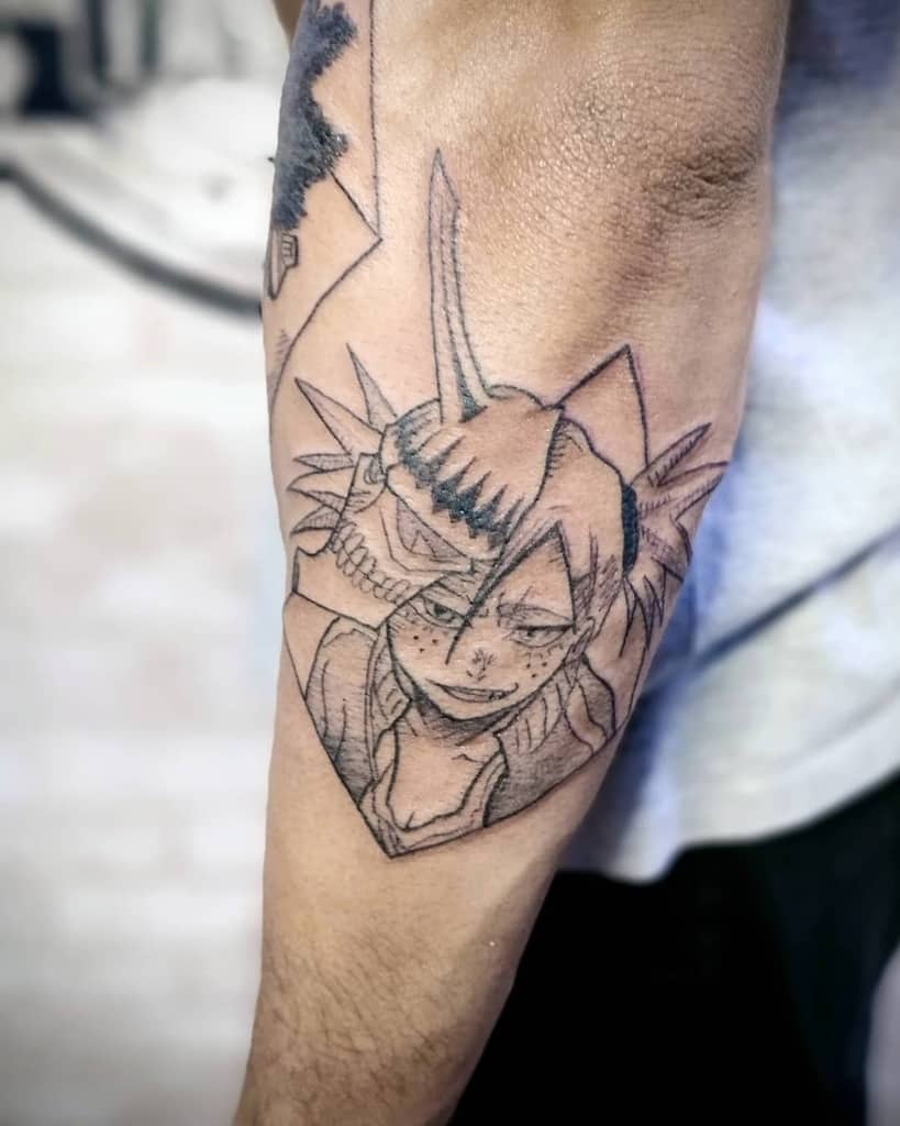 Black ink tattoo, featuring a detailed Bleach character with a mask and spiked hair and a skull mask with a horn