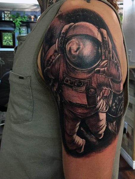 Arm Cosmic Tattoo On Man With Astronaut