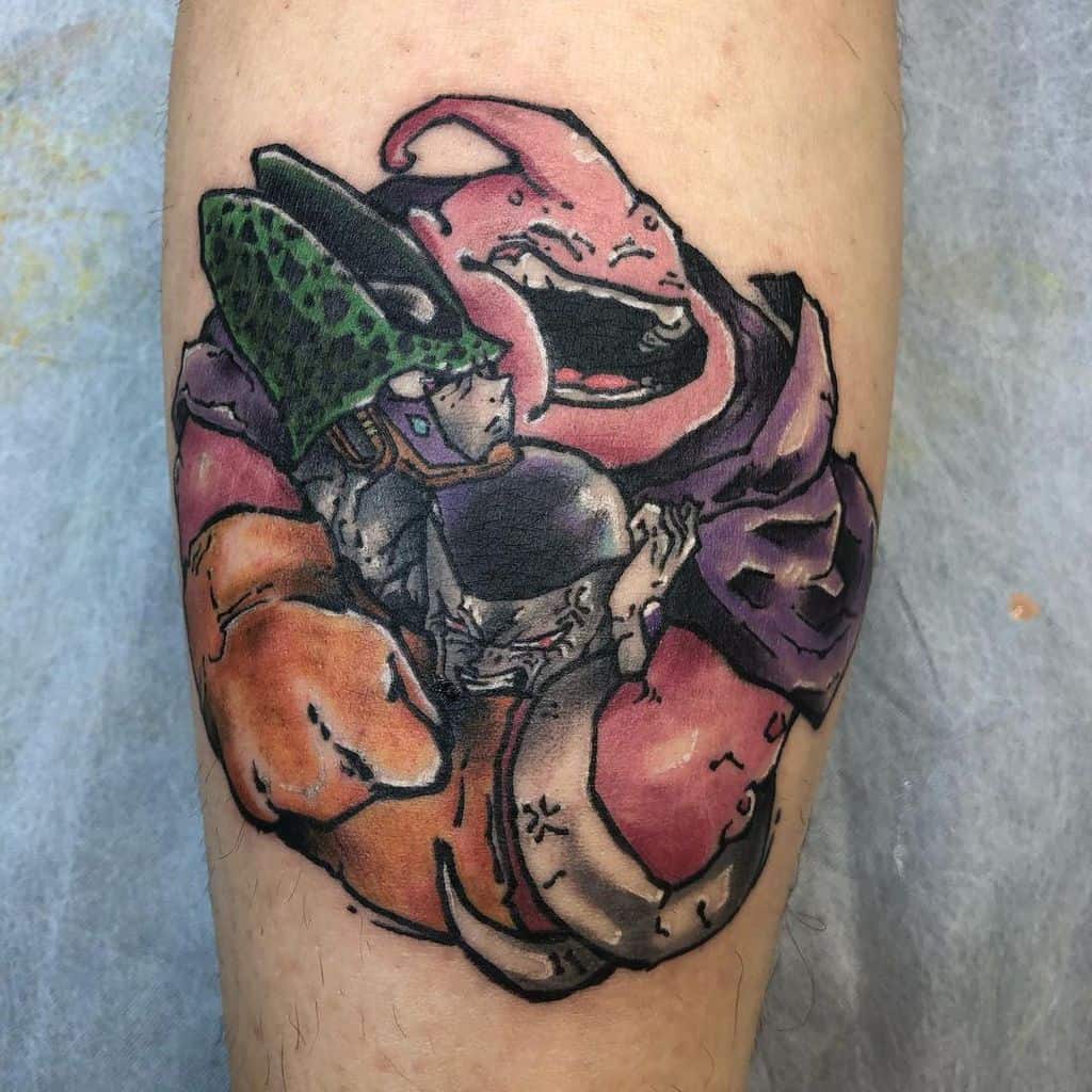 A tattoo featuring Cell and Majin Buu from Dragon Ball, engaging in an intense pose with vibrant colors and dramatic shading.