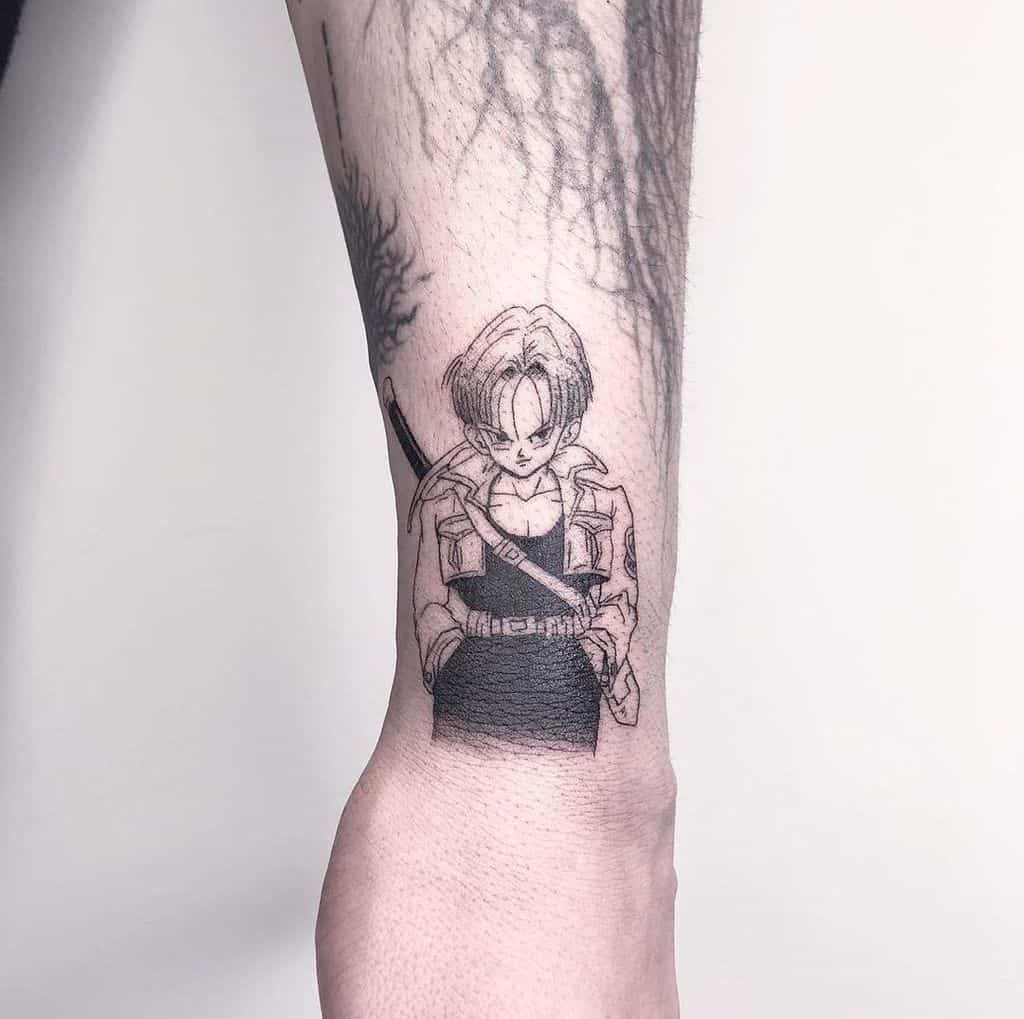 A black and white tattoo of Trunks from Dragon Ball, standing with a sword slung across his back, showing a serious expression.