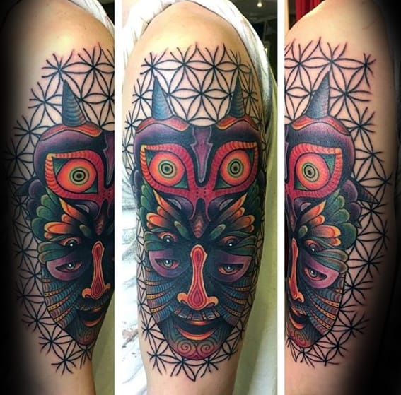 Arm Geometric Majoras Mask Mens Tattoo Ideas