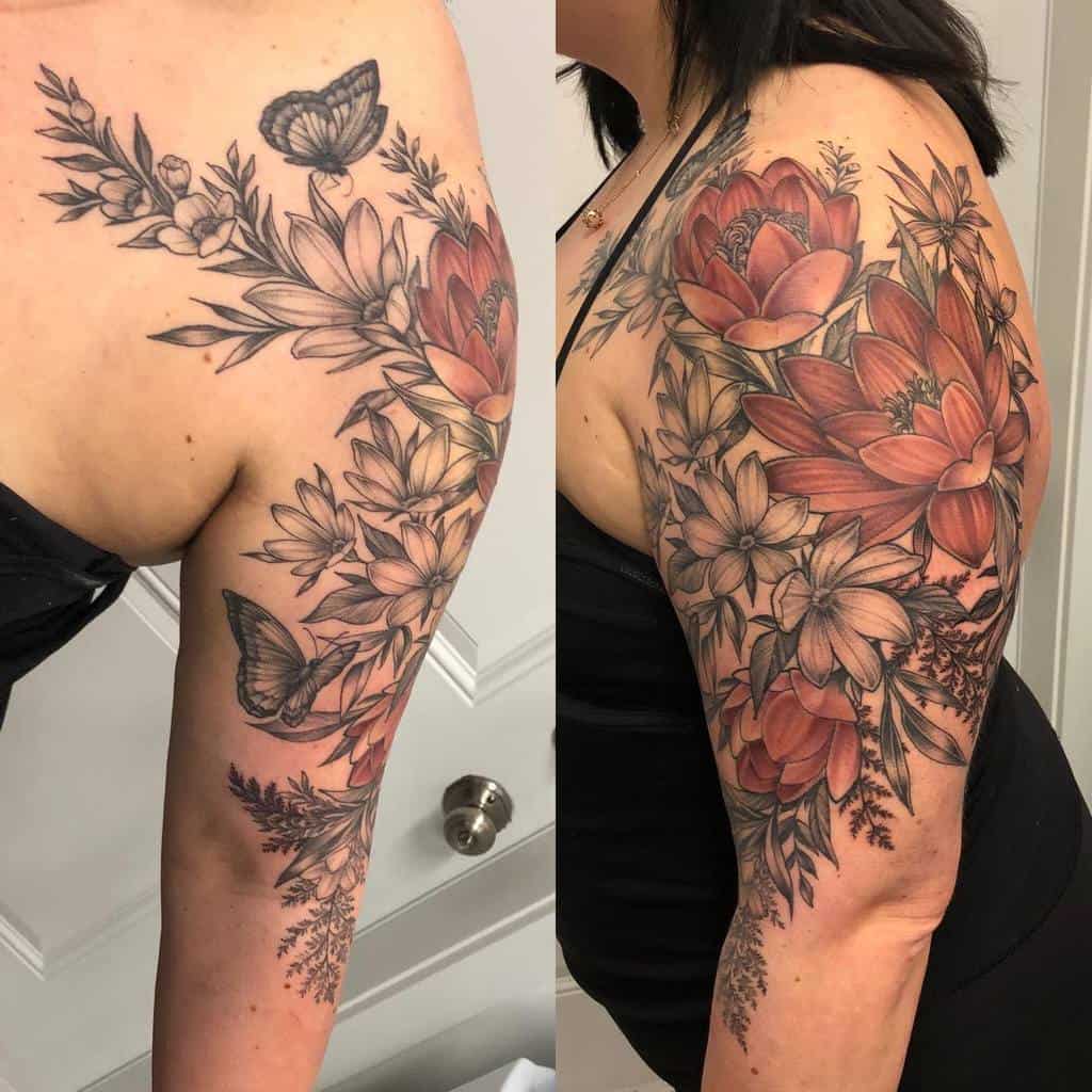 Arm tattoo featuring detailed flowers and butterflies, with a blend of black and colored ink