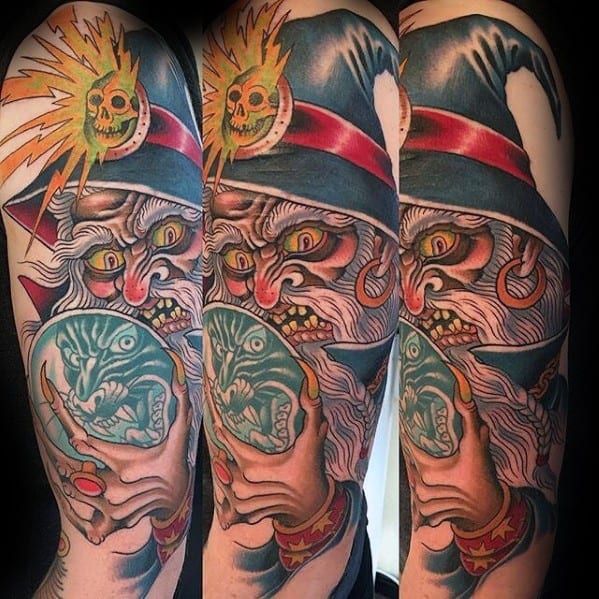 Arm Male Witch Crystal Ball Tattoo Design Inspiration