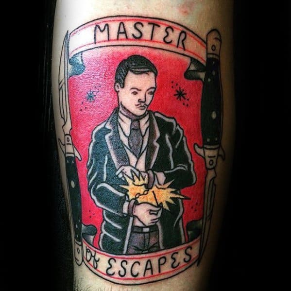 Tattoo of an escape artist with "Master of Escapes" text and two knives on a red background