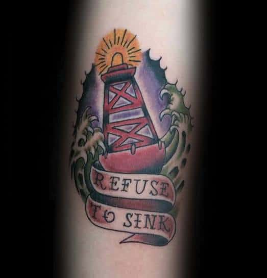 Lighthouse tattoo with waves and a bold "Refuse To Sink" banner