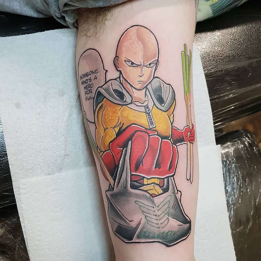  A colorful tattoo of Saitama from One Punch Man, holding groceries with a serious expression, featuring his quote, "Someone who's a hero for fun"
