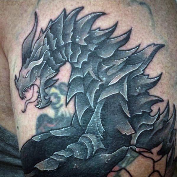 Skyrim-inspired black dragon tattoo with sharp scales and open mouth