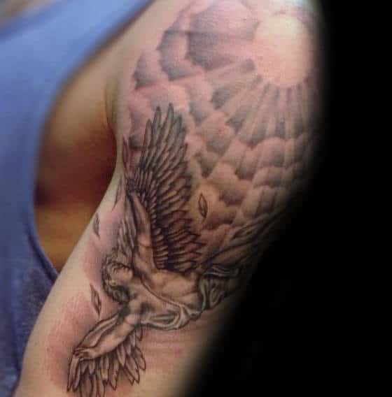 Arm Tattoo Of Icarus On Male
