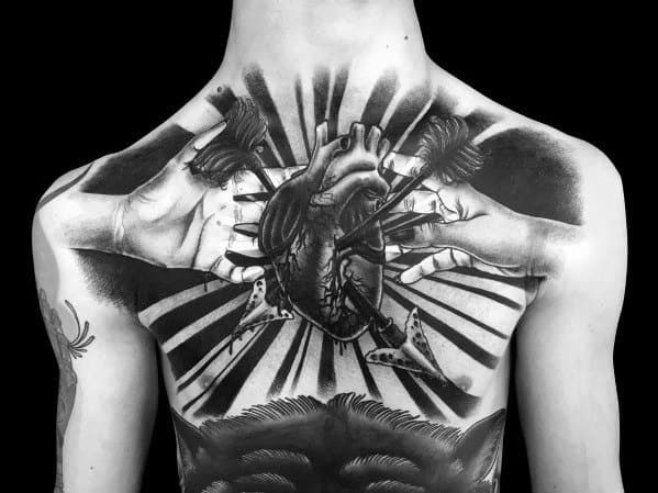 Black and grey 3D tattoo of an anatomical heart pierced by arrows, held by hands, with radiating lines creating a bold, dramatic back design.