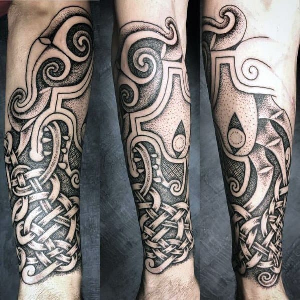 Celtic wolf forearm tattoo with bold black outlines, knotwork at the base, and dotwork shading forming abstract tribal-style elements.