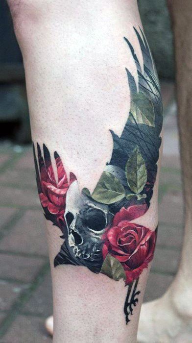 Tattoo of a crow in flight with a skull, red roses, and green leaves blending into its wings in a dark, artistic design.