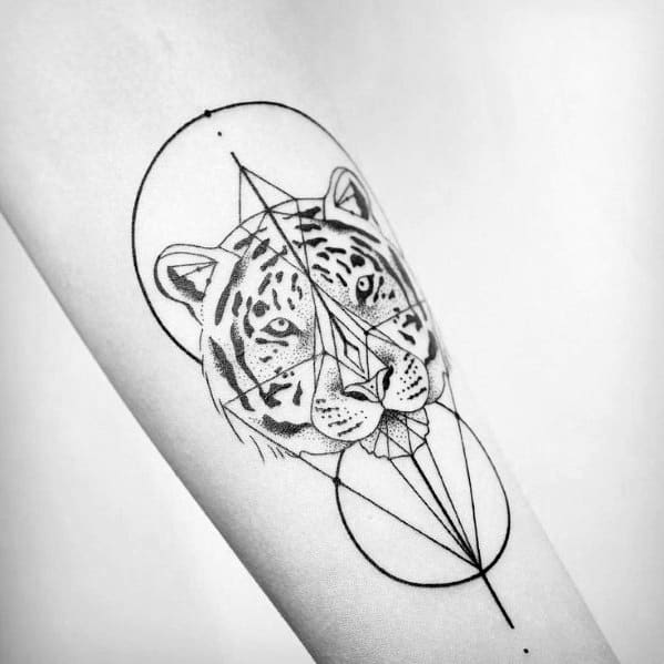 Minimalist geometric tiger tattoo on forearm, combining fine line work and abstract shapes with a realistic tiger face.