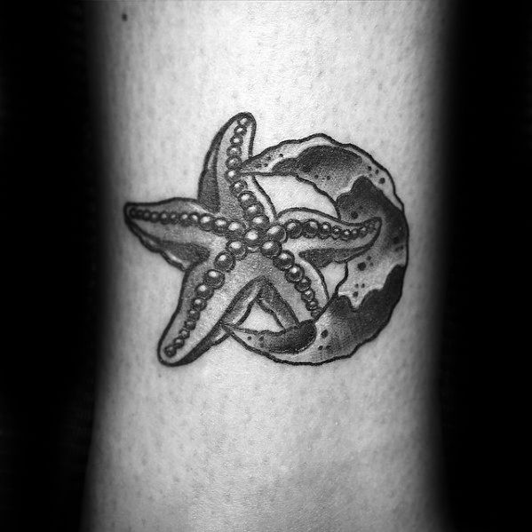 Black and grey tattoo of a starfish paired with a crescent moon, featuring bold shading and dotted texture on the starfish.