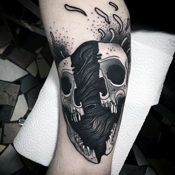 Artistic Skull In Two Mens Leg Tattoos