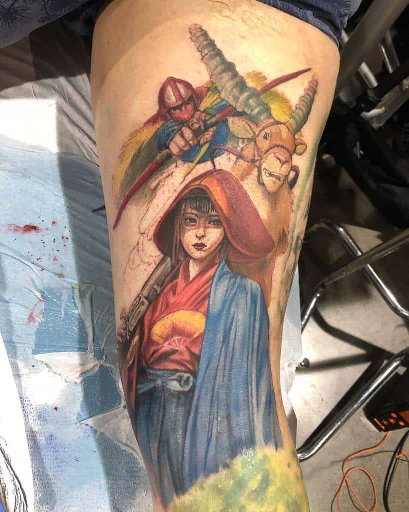 Leg tattoo featuring Ashitaka on Yakul aiming his bow, with a detailed portrait of Lady Eboshi in a hooded cloak from Princess Mononoke.