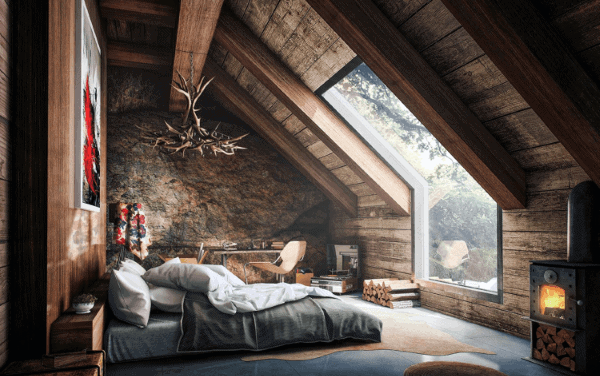 Cozy attic bedroom with wooden beams, a large window, stone wall, fireplace, and rustic decor