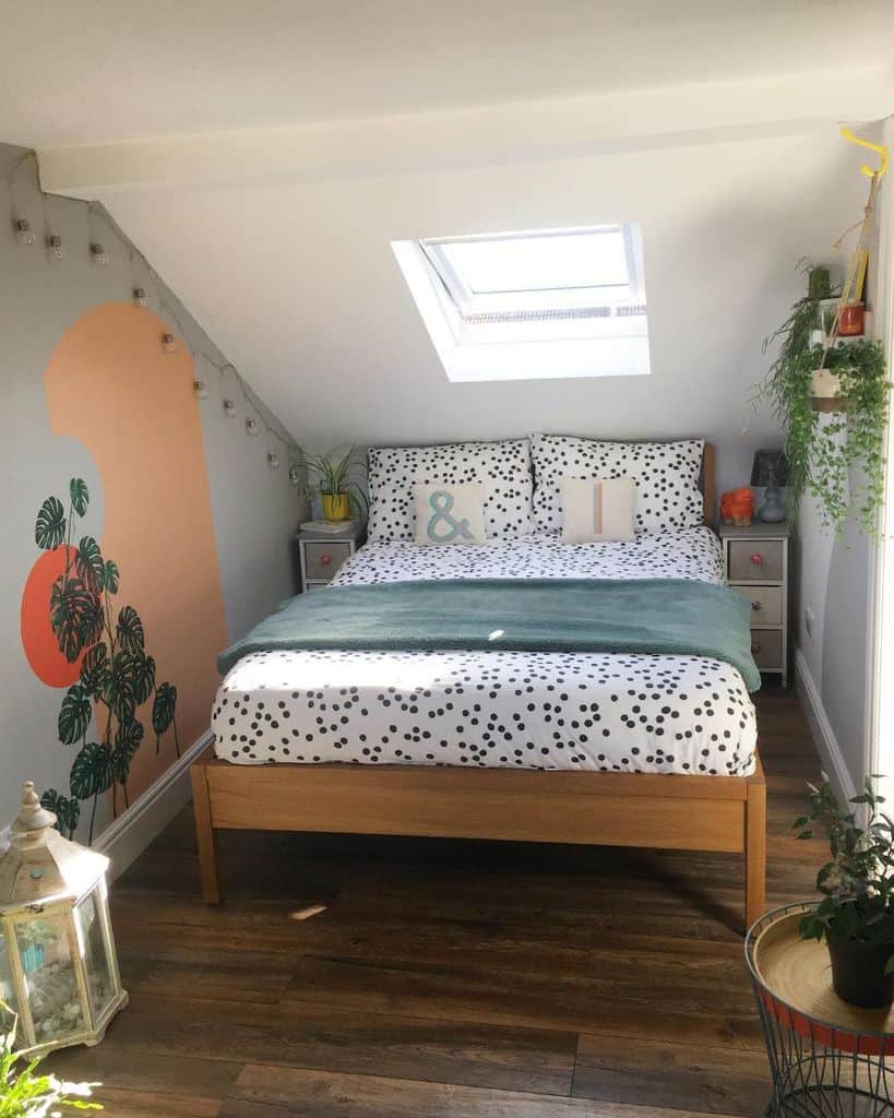 attic bedroom skylight wall mural wood bed frame floorboards