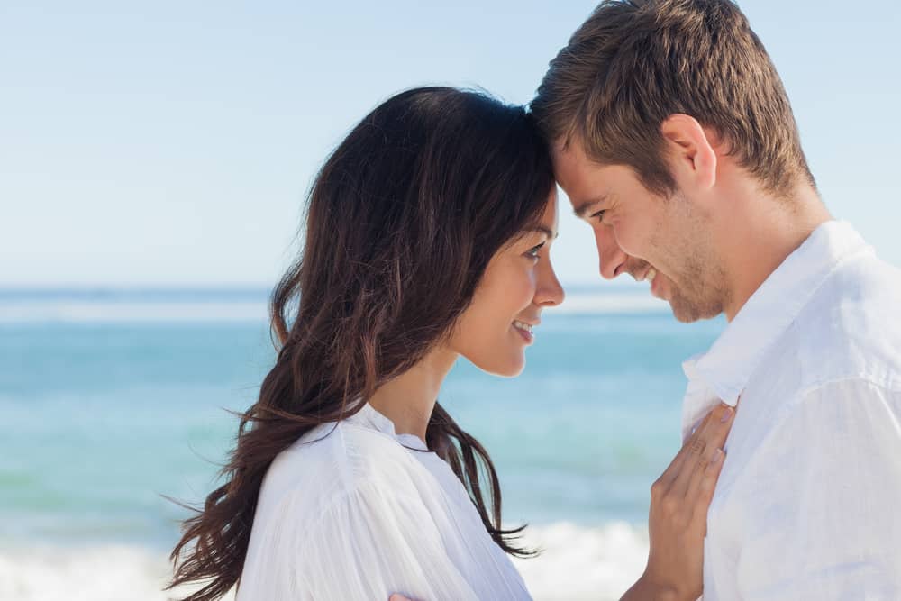 attractive couple on beach