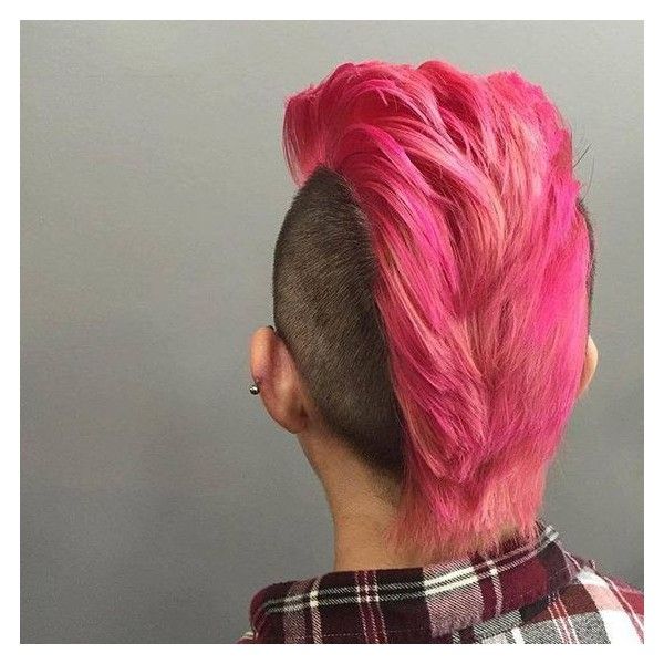 Cyberpunk cut for women with long Mohawk shaded auburn and faded sides hued black