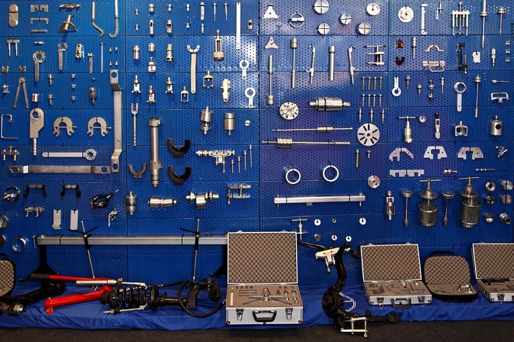 auto repair garage wall blue pegboard