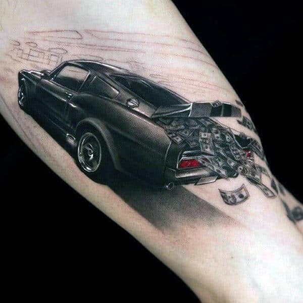 Tattoo of a car with its trunk open, spilling out dollar bills, on a forearm