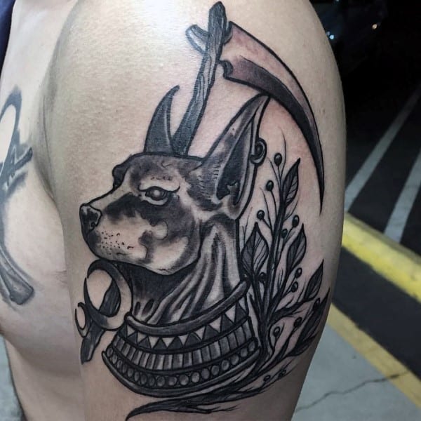 Awesome Anubis Upper Arm Male Tattoo With Shaded Black Ink