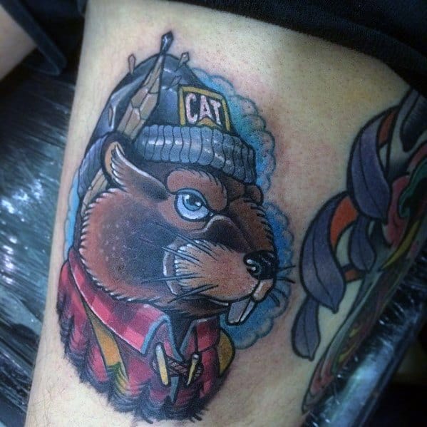 Cartoon-style beaver tattoo with a tough expression, wearing a CAT beanie and red flannel, set against a blue background.