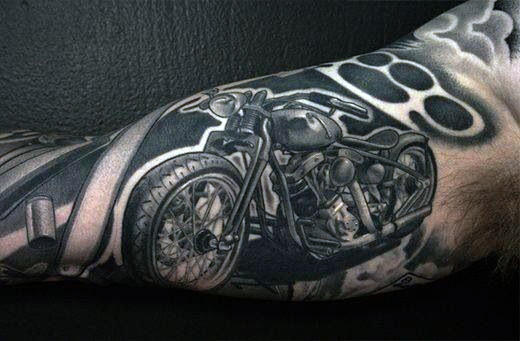 Awesome Biker Tattoo On Mans Arm With Shaded Ink Design