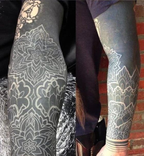 Awesome Blackwork White Ink Sleeve Tattoo On Man