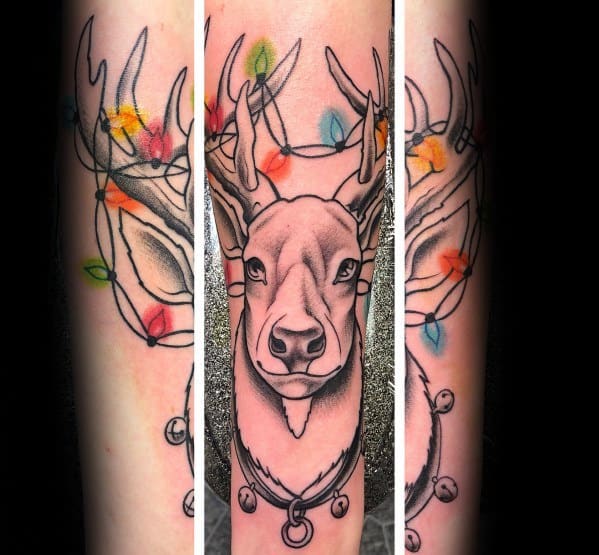 Christmas tattoo of a reindeer with detailed black and grey shading, adorned with jingle bells and colorful holiday lights tangled in its antlers.